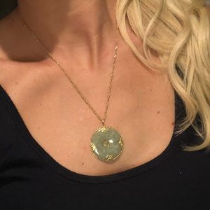 Genuine jade pendant 20” 18kt gold rope chain.
